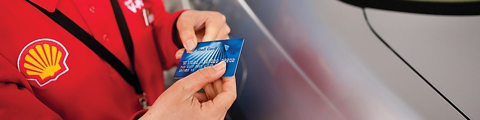 woman with Shell card at Retail site